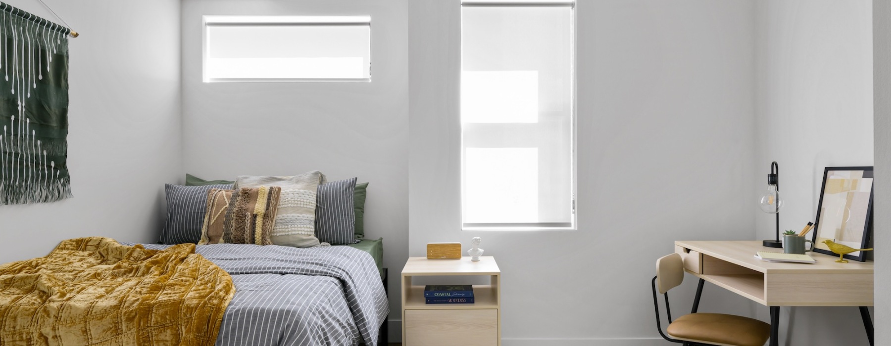 Bedroom with natural lighting and high ceilings