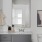 bathroom sink with large mirror