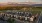 neighborhood view of Boötes surrounded by fields, forest and mountains