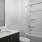bright bathroom with shower/tub combo