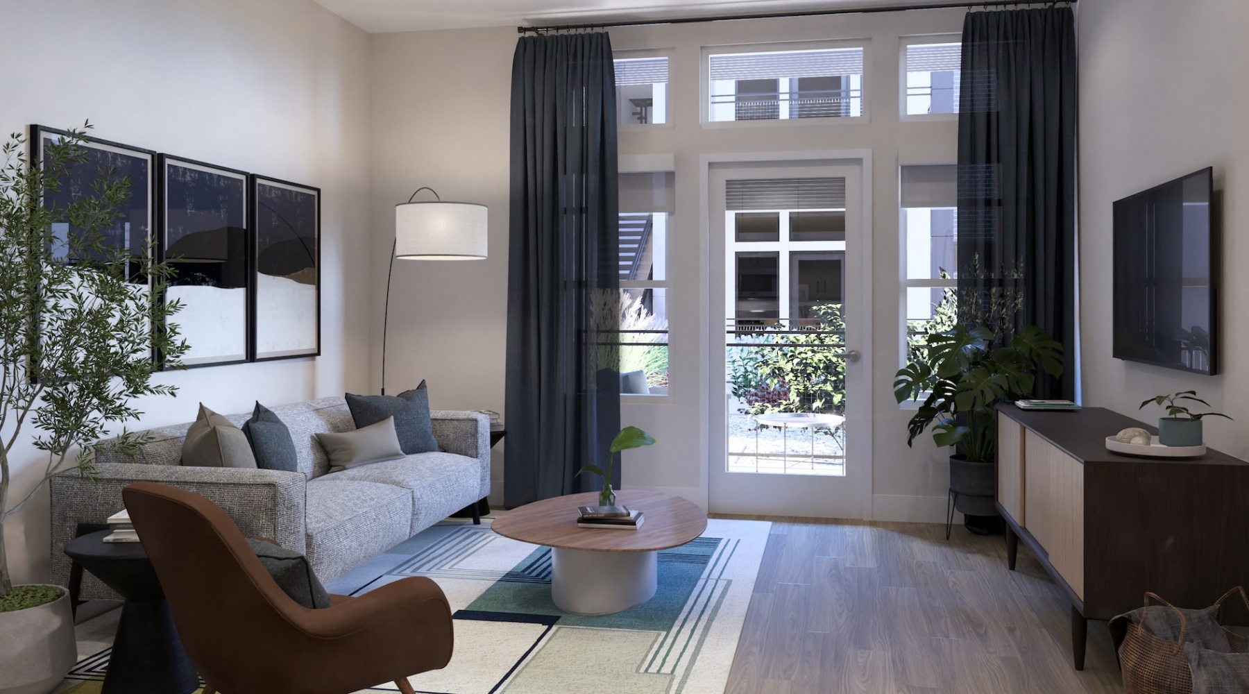 Relax and unwind in stylish living spaces Living room with a couch, tv, and large glass door