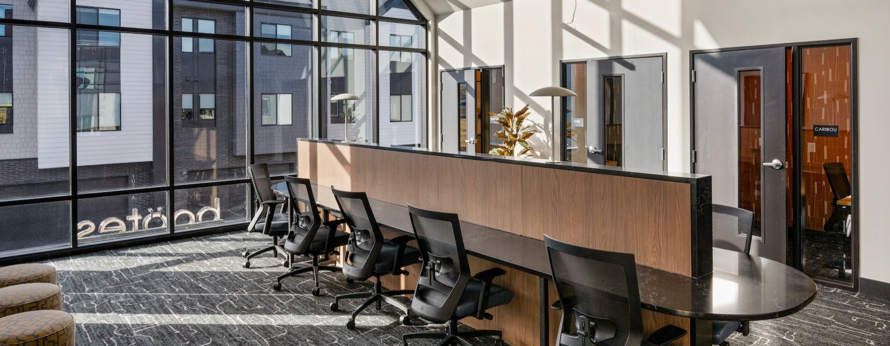 a study lounge with large windows